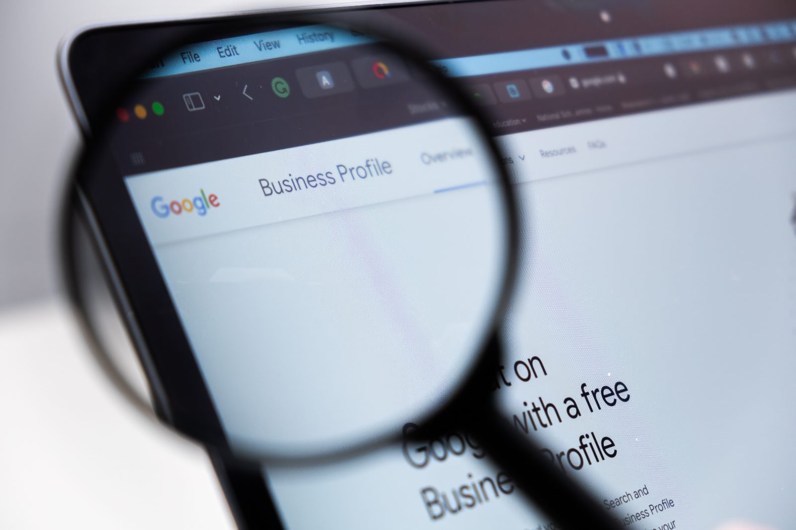 Google Business Profile page viewed through a magnifier