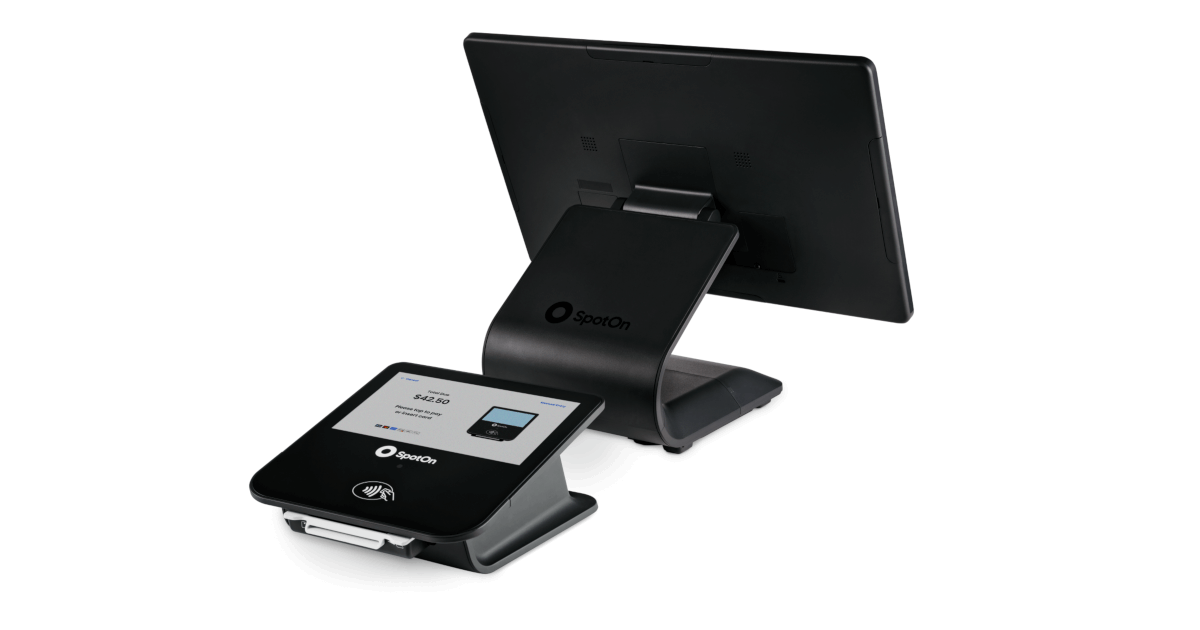 SpotOn POS system with touchscreen tablet and monitor display on black stands